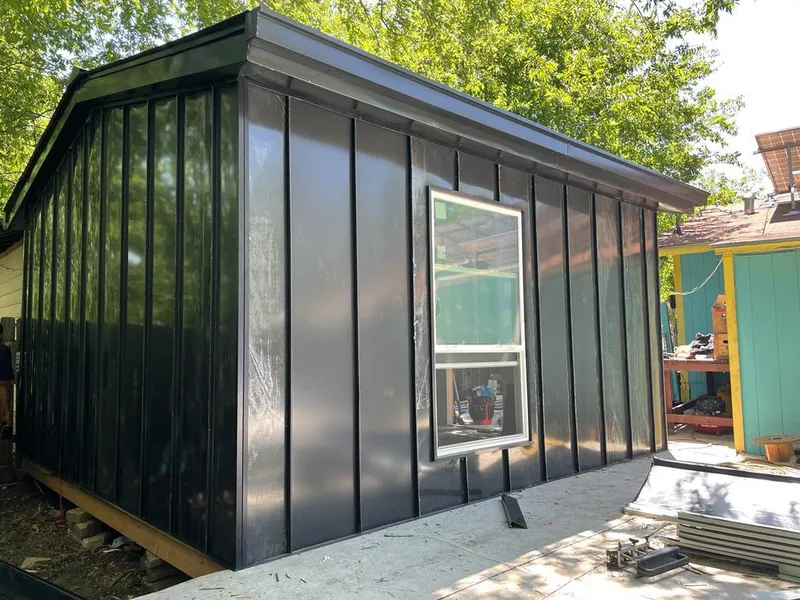 Black standing seam metal wall panels for Metal Roof Installation in Palm Valley