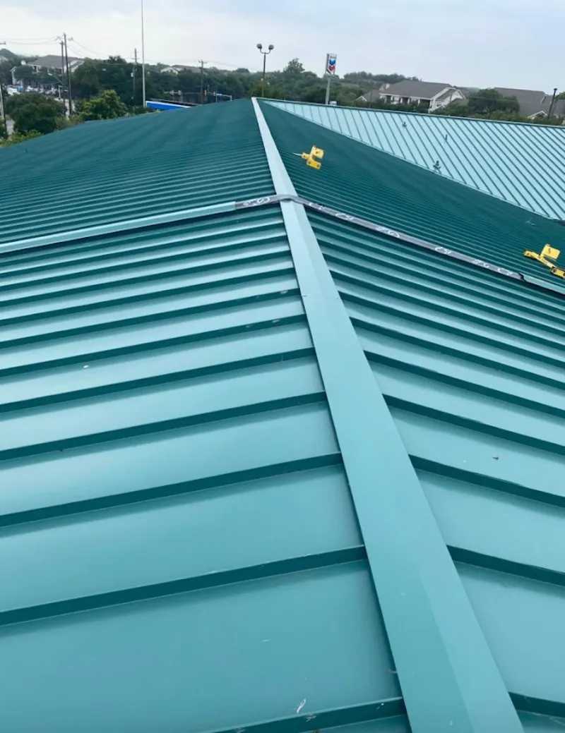 Green commercial metal roof ridge and valley for Metal Roof Repair in Palm Valley